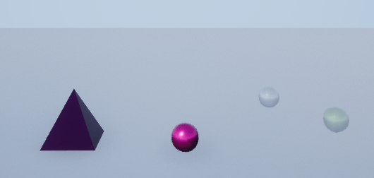 A pyramid actor and three spherical balls in a 3D environment, with the balls showing varying levels of transparency from opaque to semi-transparent.