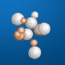 Orange spheres overlaid on a 3-D scene of white spheres